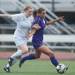 Pioneer's Jennifer Fichera drives the ball up field as Skyline's Jessica Krueger frights for the ball in the first half the district finals, Friday May 31.
Courtney Sacco I AnnArbor.com